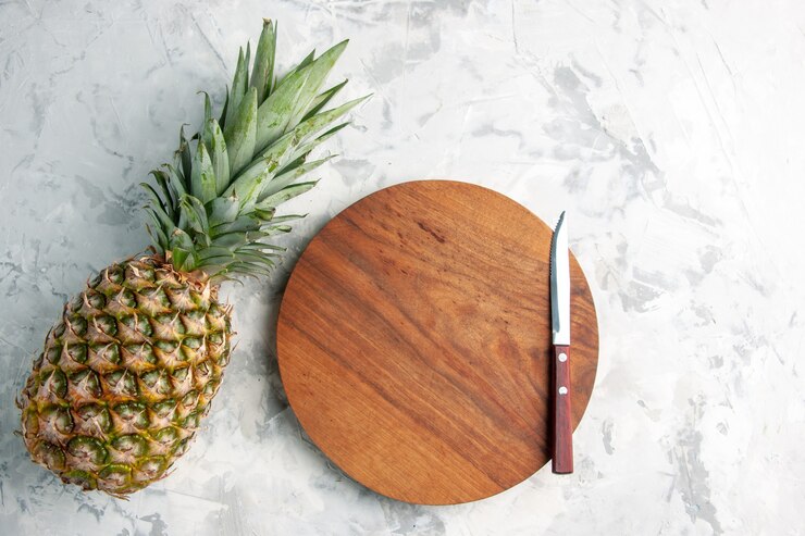 Front View Whole Fresh Golden Pineapple Cutting Board Knife Table Marble Surface 140725 97210