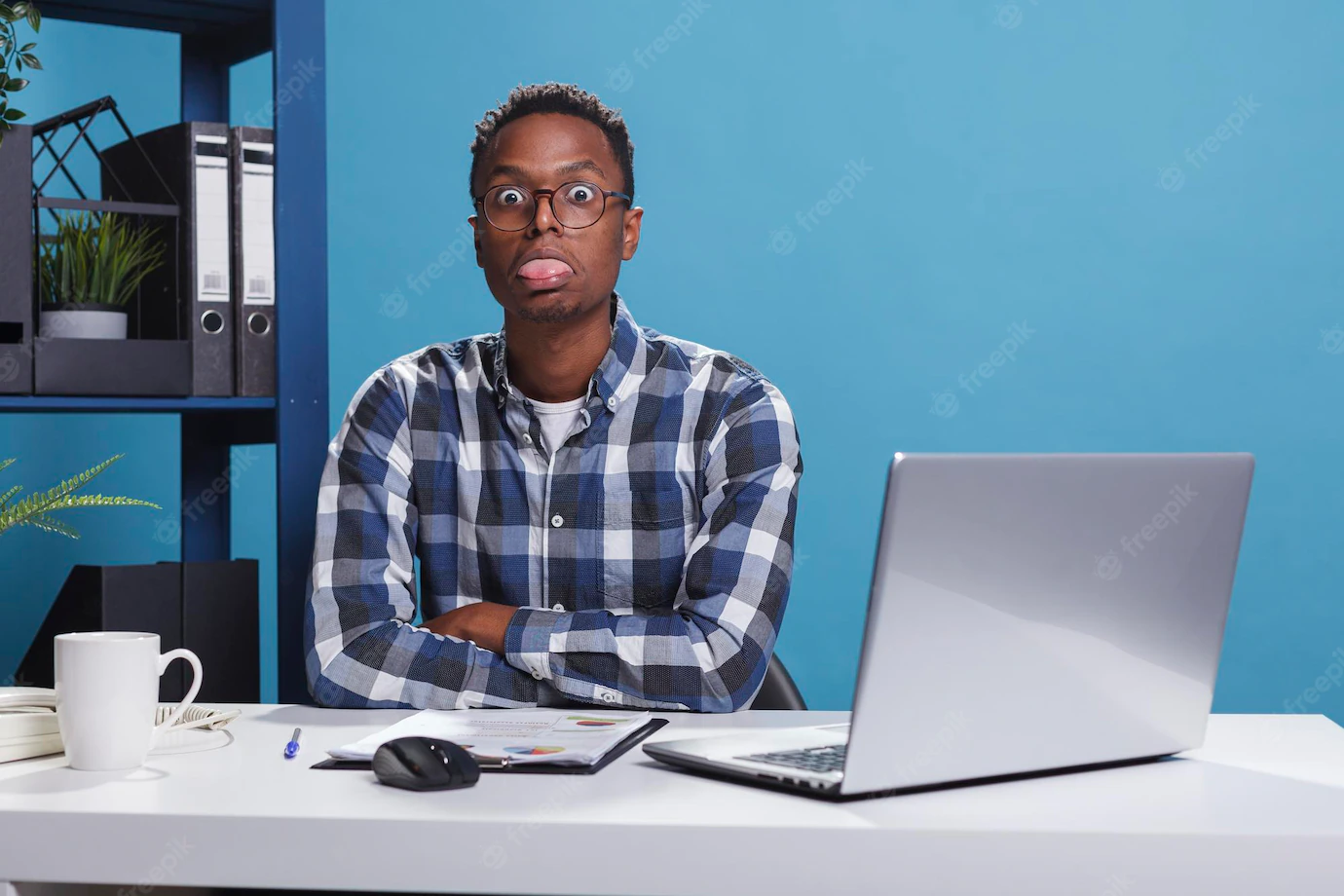 Funny Goofy Office Working Person Making Amusing Playful Face While Sticking Out Tongue Childish Dumb Young Adult Man With Dullard Face Expression While Company Workspace 482257 40373