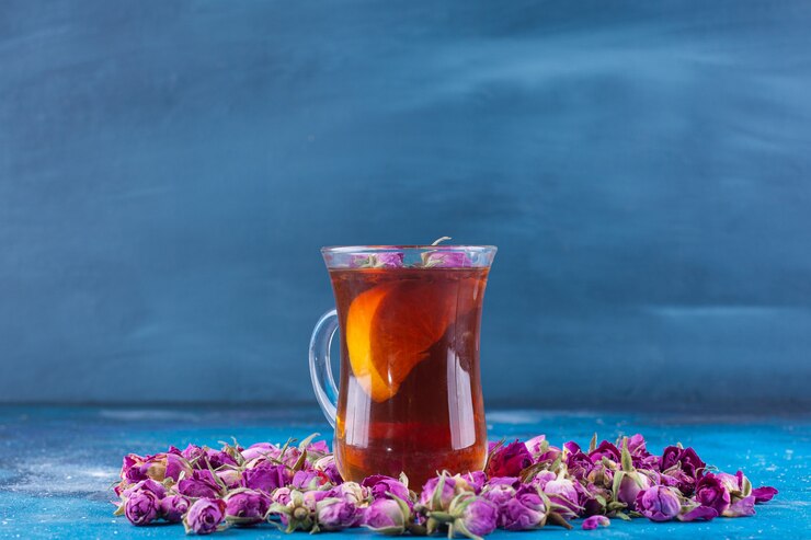 Glass Tea With Budding Roses Placed Blue Table 2831 8254