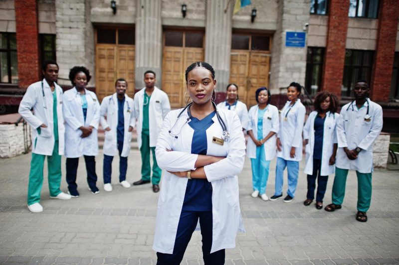 Group of african doctors students near medical university outdoor Free Photo