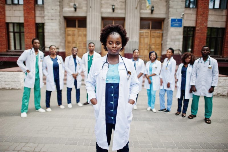 Group of african doctors students near medical university outdoor Free Photo