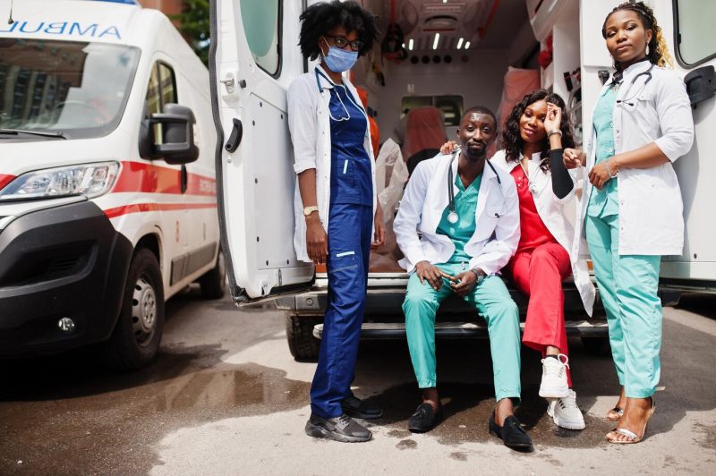 Group of african paramedic ambulance emergency crew doctors Free Photo