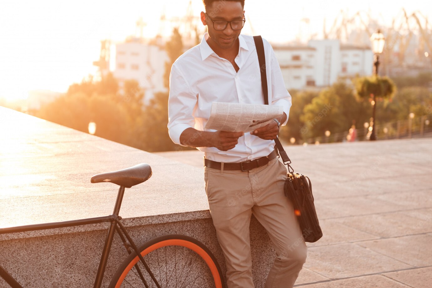 Handsome Young African Man Early Morning With Bicycle Reading Newspaper 171337 12958
