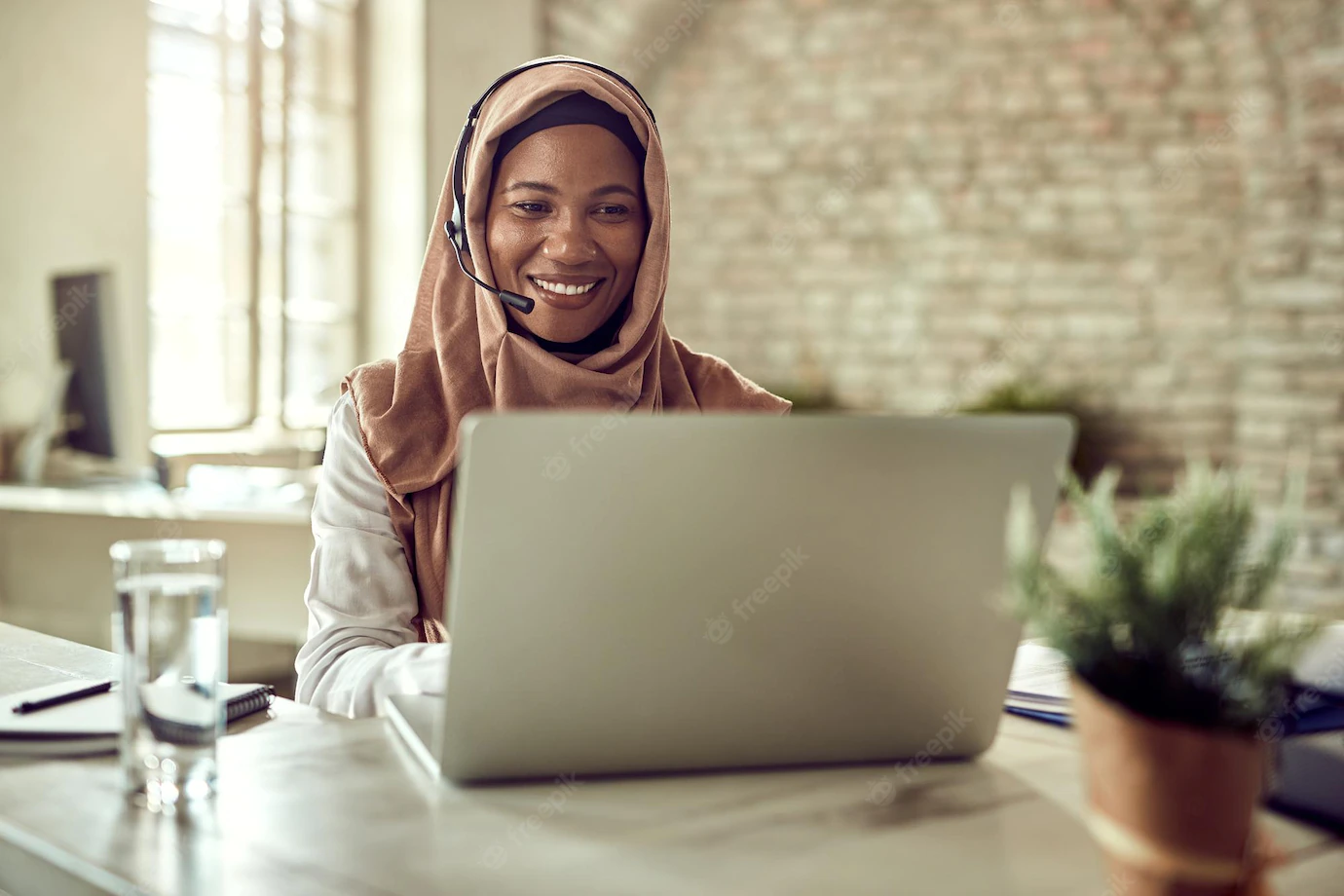 Happy Islamic Businesswoman Working Computer Communicating Headset Office 637285 6443