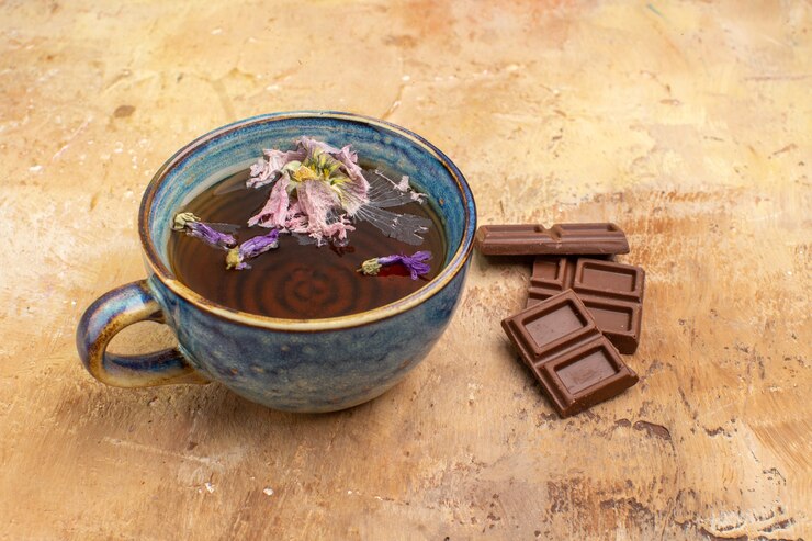 Horizontal View Cup Hot Herbal Tea Chocolate Bars Mixed Color Table 140725 86862