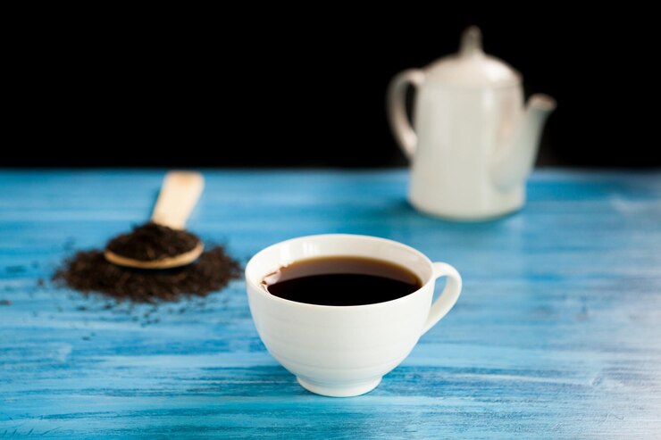 Hot Tea Spoon With Tea Leaves Vintage Blue Board Black Background 482257 34553