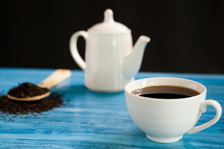 Hot Tea Spoon With Tea Leaves Vintage Blue Board Black Background 482257 34555