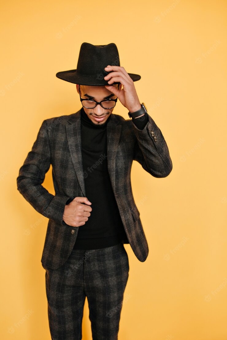 Indoor Portrait Glad African Male Model Playfully Posing Yellow Wall Confident Black Young Man Jacket Touching His Hat During Photoshoot 197531 21954