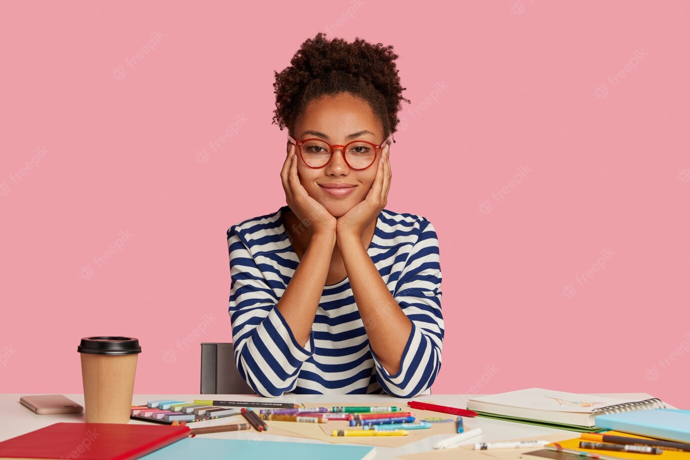 Indoor Shot Dark Skinned Fashion Designer With Crisp Hair Touches Cheeks With Both Hands Wears Striped Clothes Works New Creative Project Poses Workplace Against Pink Wall 273609 29148