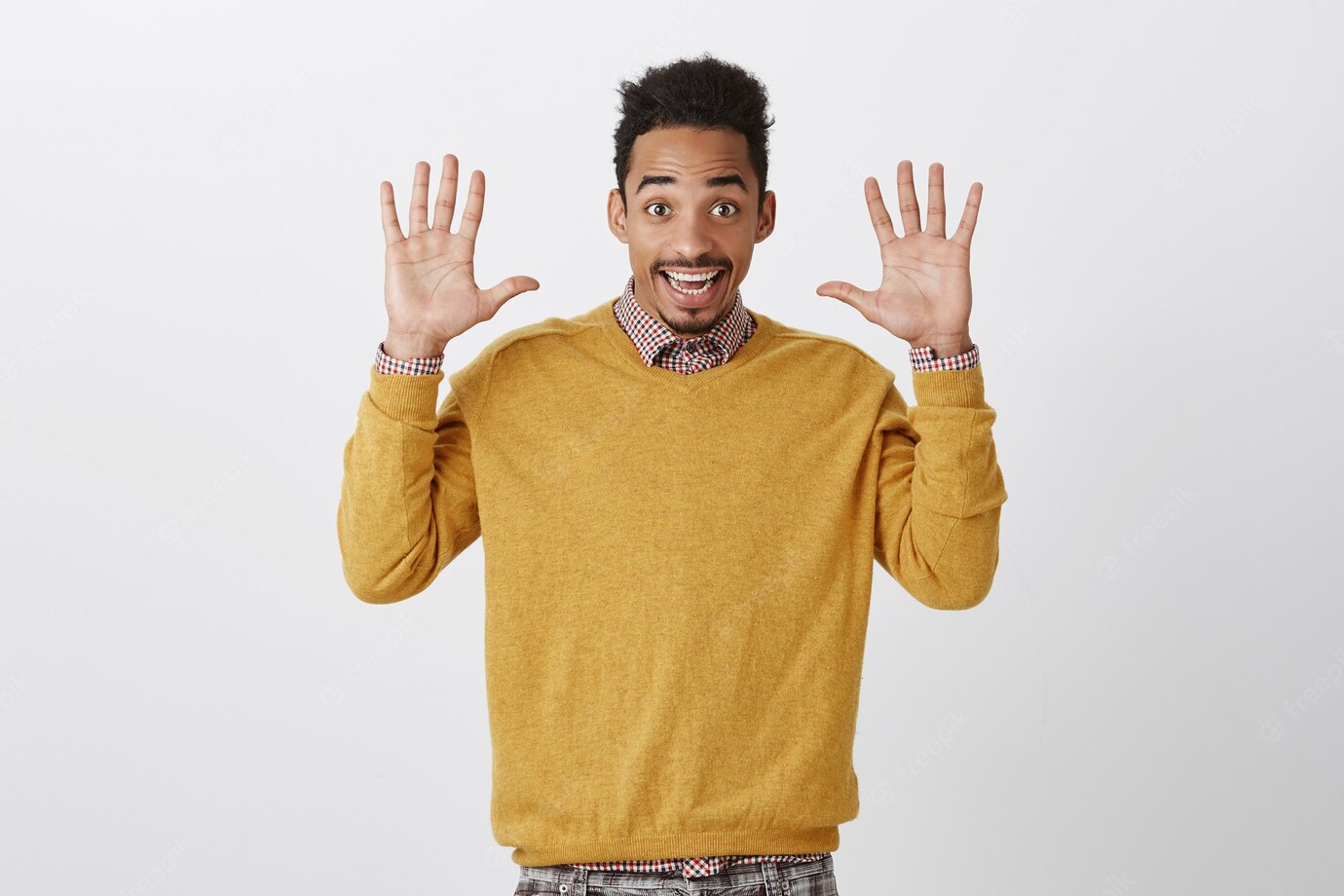 Jazz Hands Always Trend Portrait Happy Emotive Young Male With Afro Haircut Raising Palms Smiling Broadly Surrendering Expressing Friendliness Good Mood 176420 25076