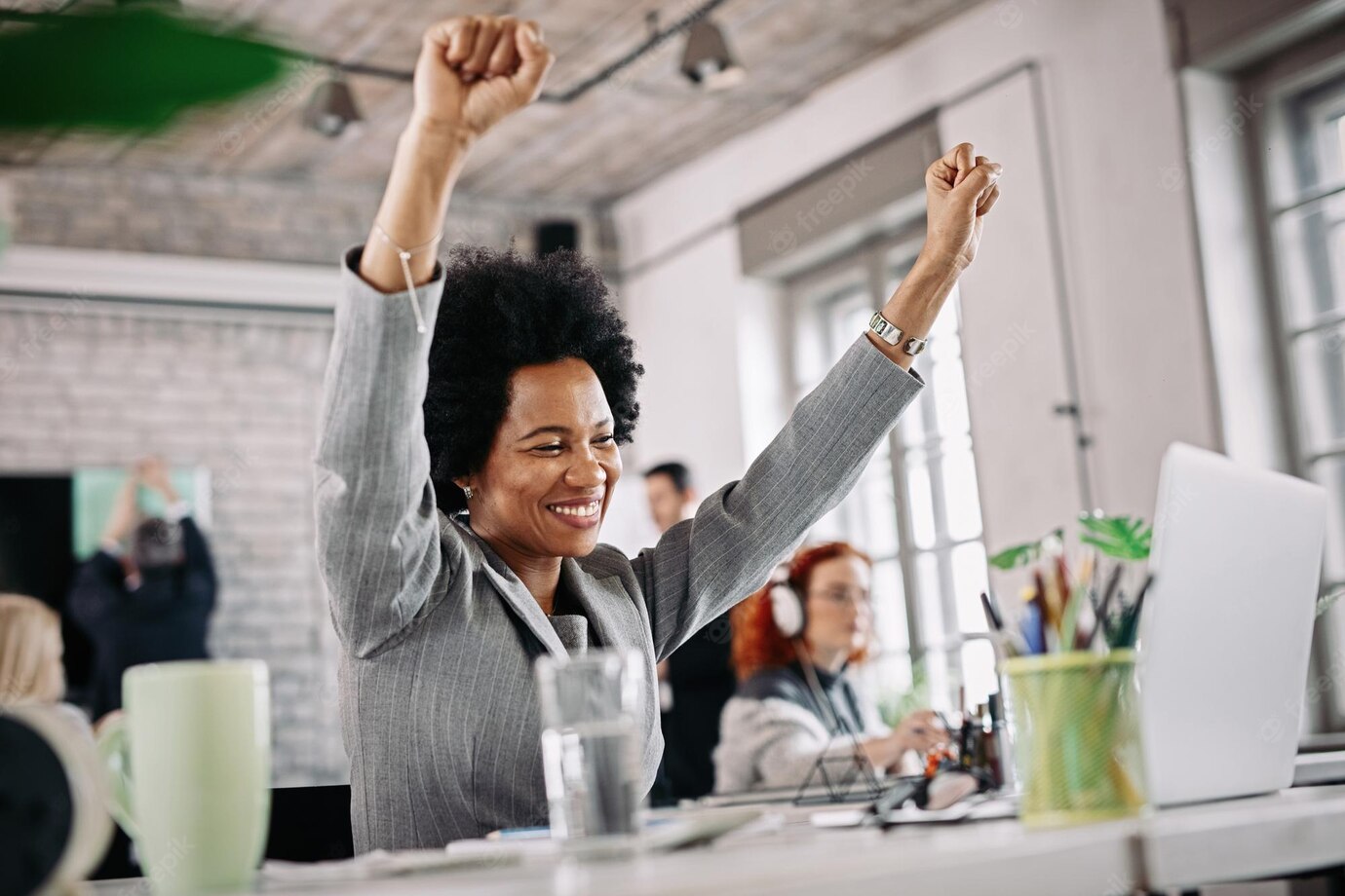 Low Angle View Happy Black Businesswoman Working Office Celebrating Her Success With Raised Arms 637285 1115