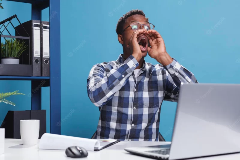 Marketing department young adult team leader shouting loud at employees to hurry up with accounting documentation. research agency employee yelling at coworkers to focus on work because of deadline. Free Photo