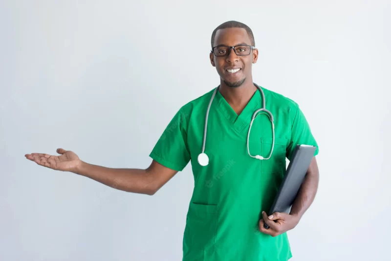 Portrait of happy young African American doctor showing palm. Free Photo