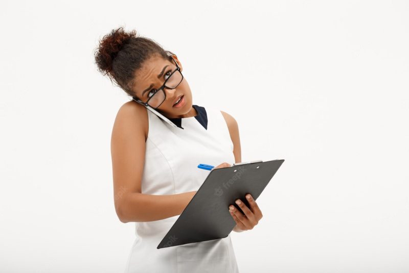 Portrait of young successful African business lady on white Free Photo