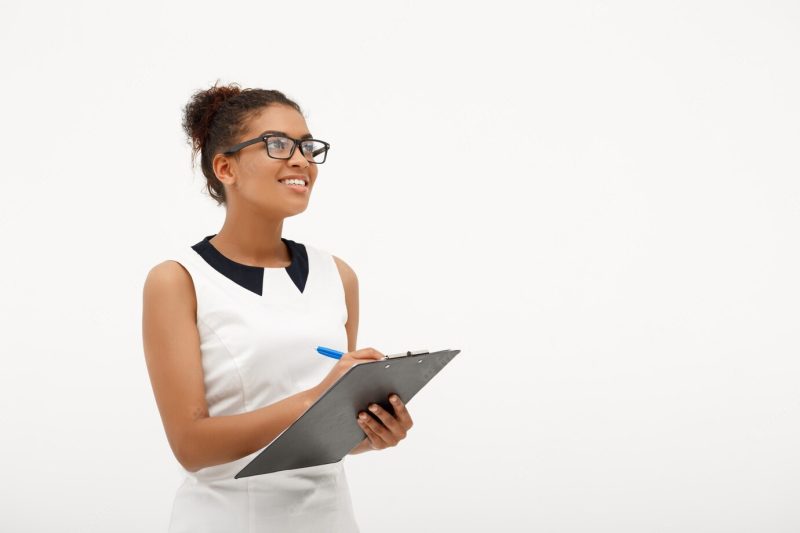 Portrait of young successful African business lady on white Free Photo