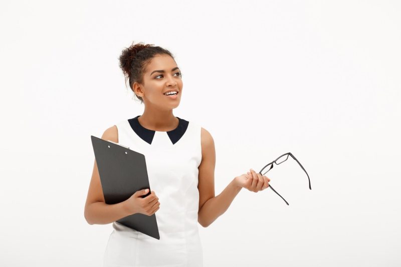 Portrait of young successful African business lady on white Free Photo