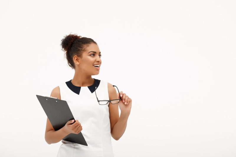 Portrait of young successful African business lady on white Free Photo