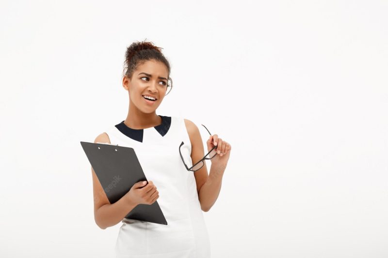 Portrait of young successful African business lady on white Free Photo