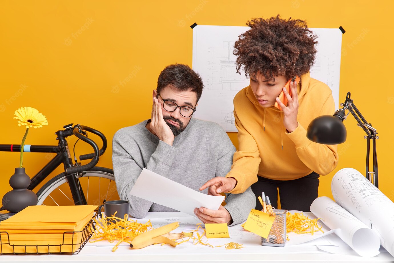 Professional Male Engineer Looks Sadly Paper Listens Explanation From Female Trainee Who Talks Via Smartphone Pose Coworking Space Together Construction Workers Work Technical Plans 273609 50648