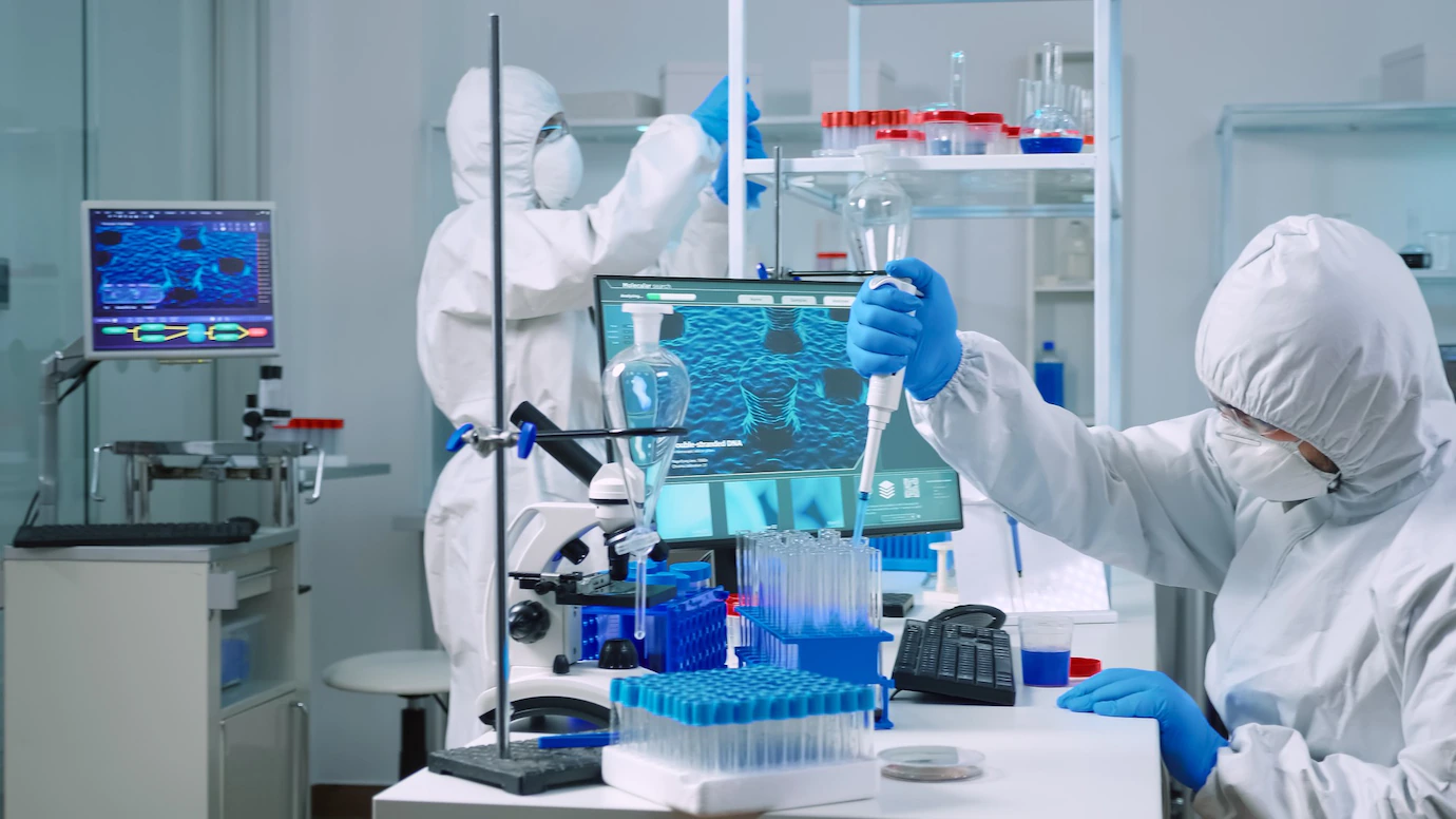 Scientist Wearing Coverall Equipped Medical Laboratory Examining Drug Discovery With Micropipette Biochemists Analysing Virus Evolution Using High Tech Researching Vaccine Against Covid19 482257 3798