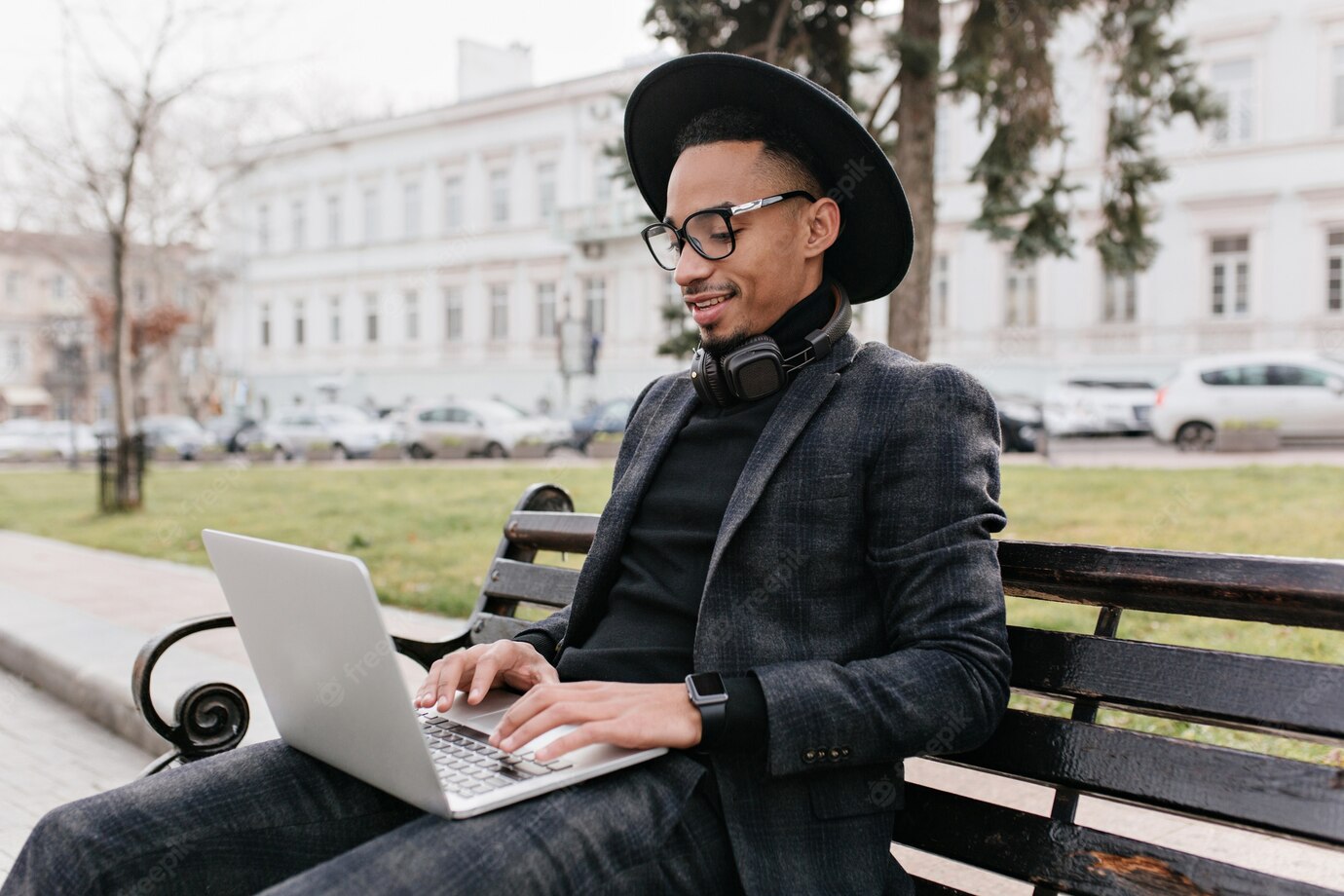 Serious African Man Black Shirt Pants Using Laptop Open Sky Outdoor Photo Mulatto Freelancer Resting Park Bench 197531 21881