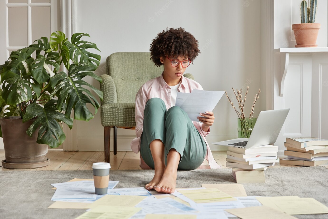 Serious Dark Skinned Female Worker Hipster Waits Update Installation Laptop Computer Sits Floor With Many Papers 273609 18709