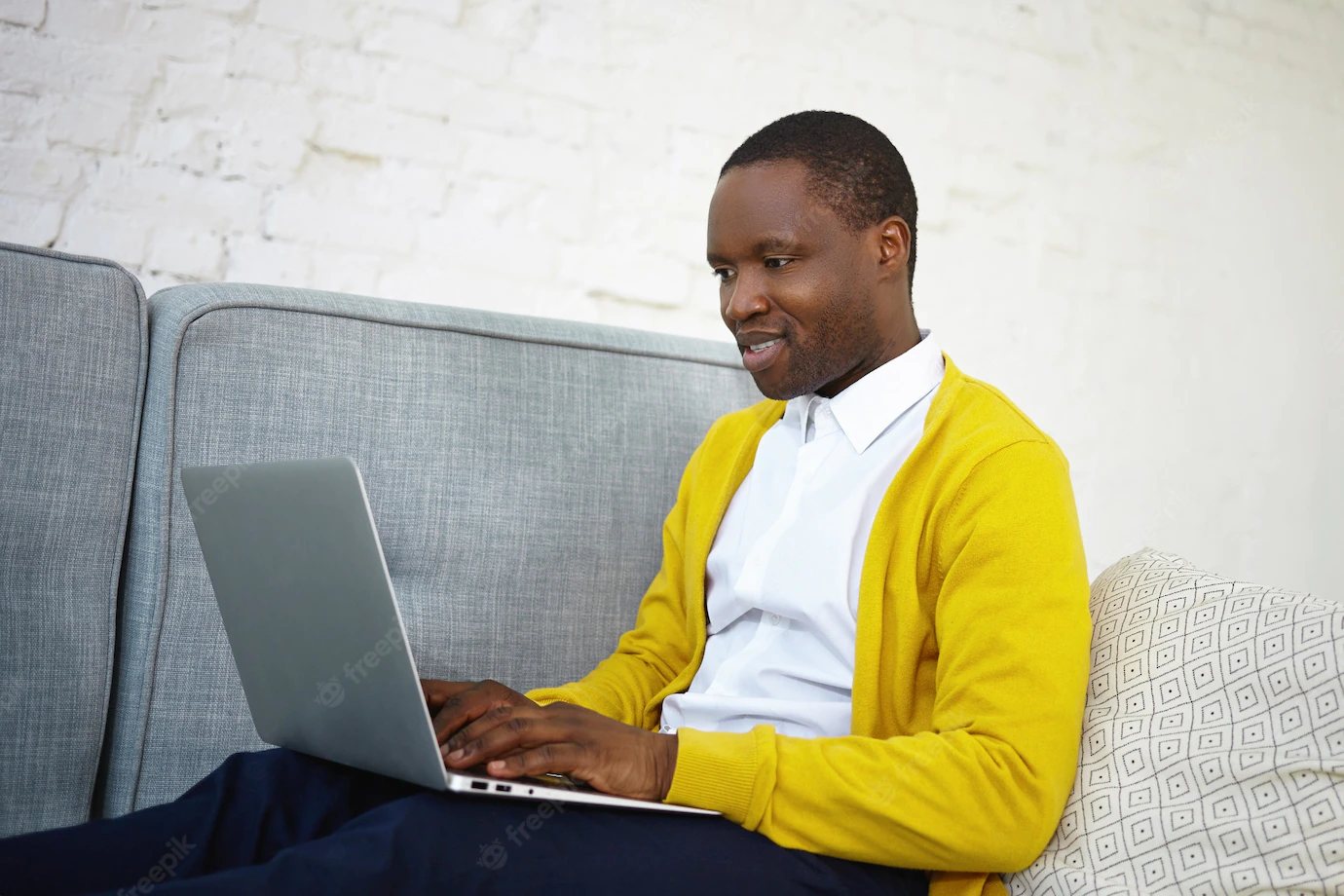 Sideways Shot Attractive Talented Dark Skinned Male Copywriter Stylish Wear Sitting Couch Home With Portable Computer His Lap Keyboarding New Article Online Internet Magazine 343059 1670