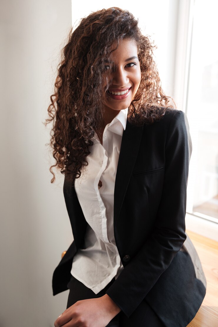 Smiling African Businesswoman Standing Near Window 171337 16068