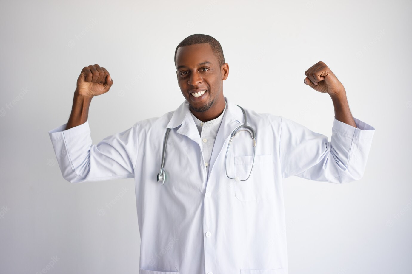 Smiling Black Male Doctor Pumping Fists Celebrating Success 1262 12503