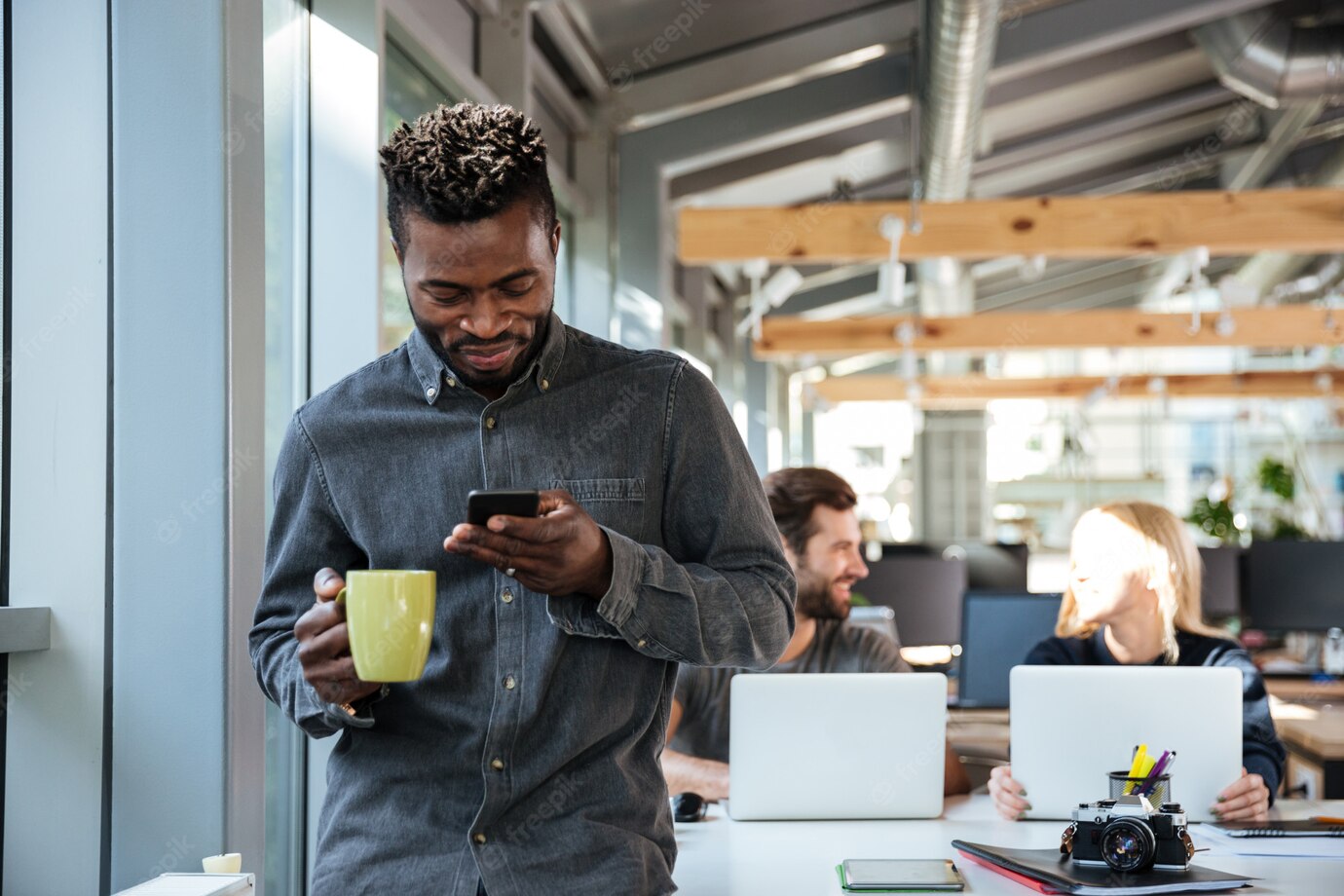 Smiling Young African Man Standing Office Chatting By Phone 171337 17654