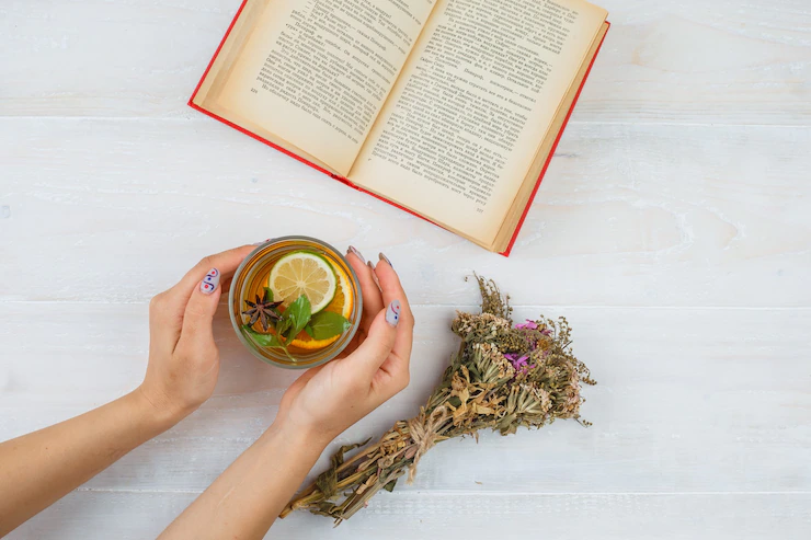 Some Herbal Tea With Books Flowers White Surface 176474 28105