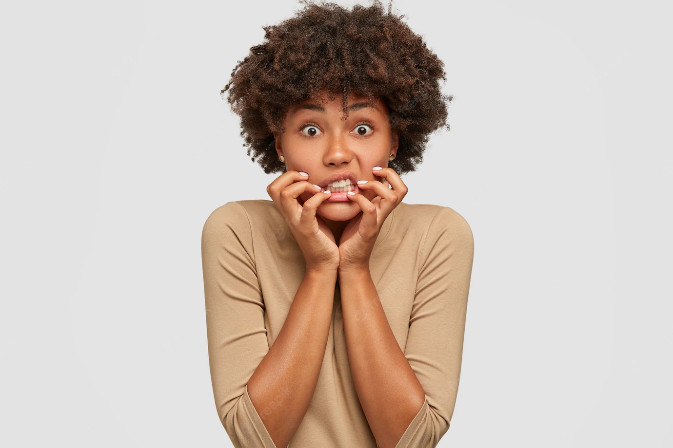 Stressful Emotive Young Woman Keeps Hands Near Mouth 273609 28022