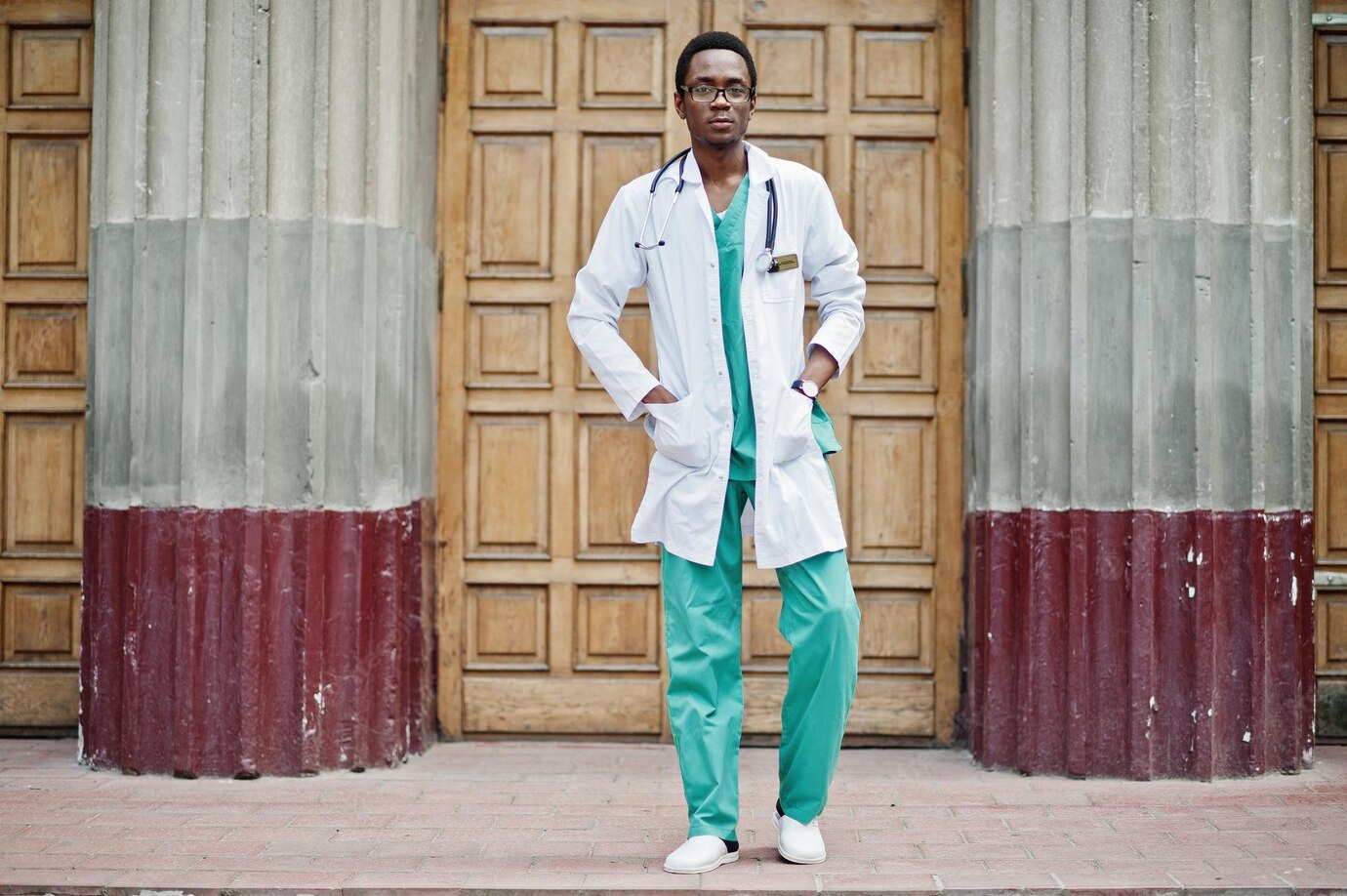 Stylish African American Doctor With Stethoscope Lab Coat Posed Against Door Hospital 627829 3175