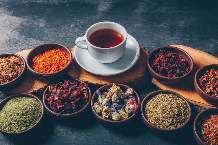 Tea Herbs Bowls With Wood Stubs Cup Tea High Angle View Dark Textured Background Space Text 176474 5178