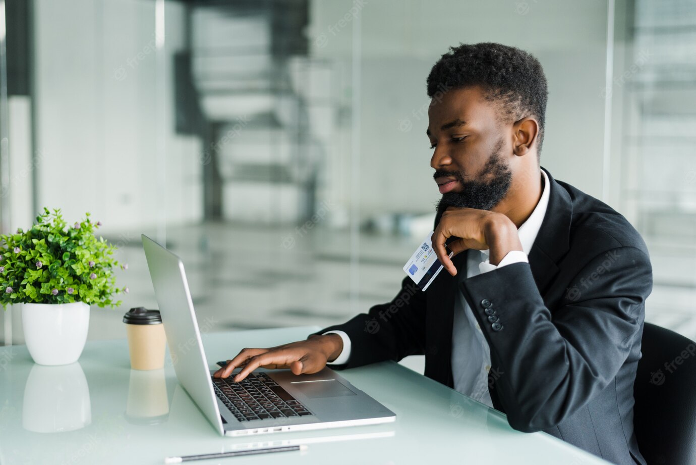 Thoughtful Young African American Businessman Working Laptop Office 231208 747