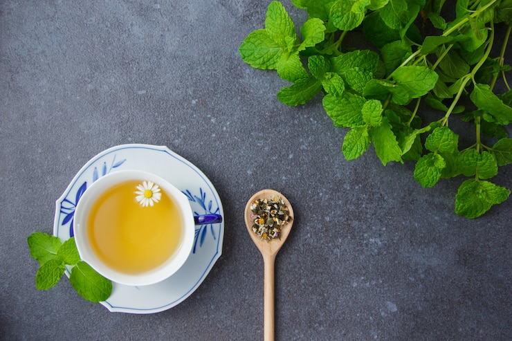 Top View Cup Chamomile Tea With Mint Leaves Chamomile Herbs Spoon 176474 4727