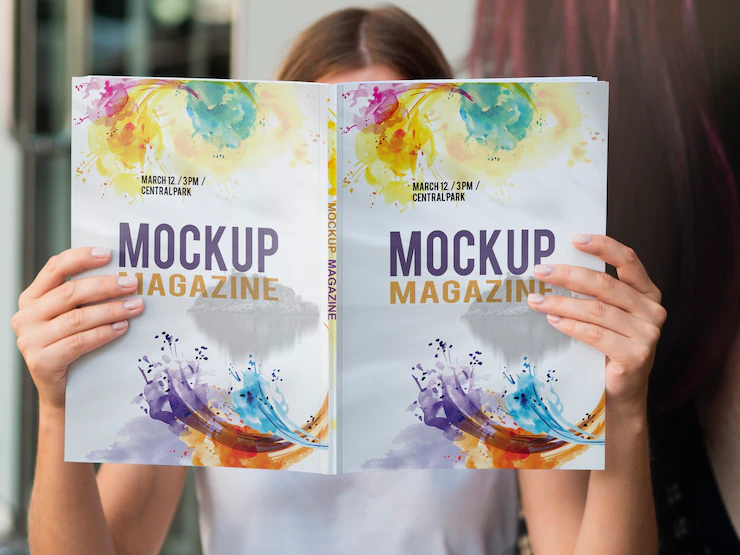 Woman Looking Into Mock Up Magazine 23 2148311890