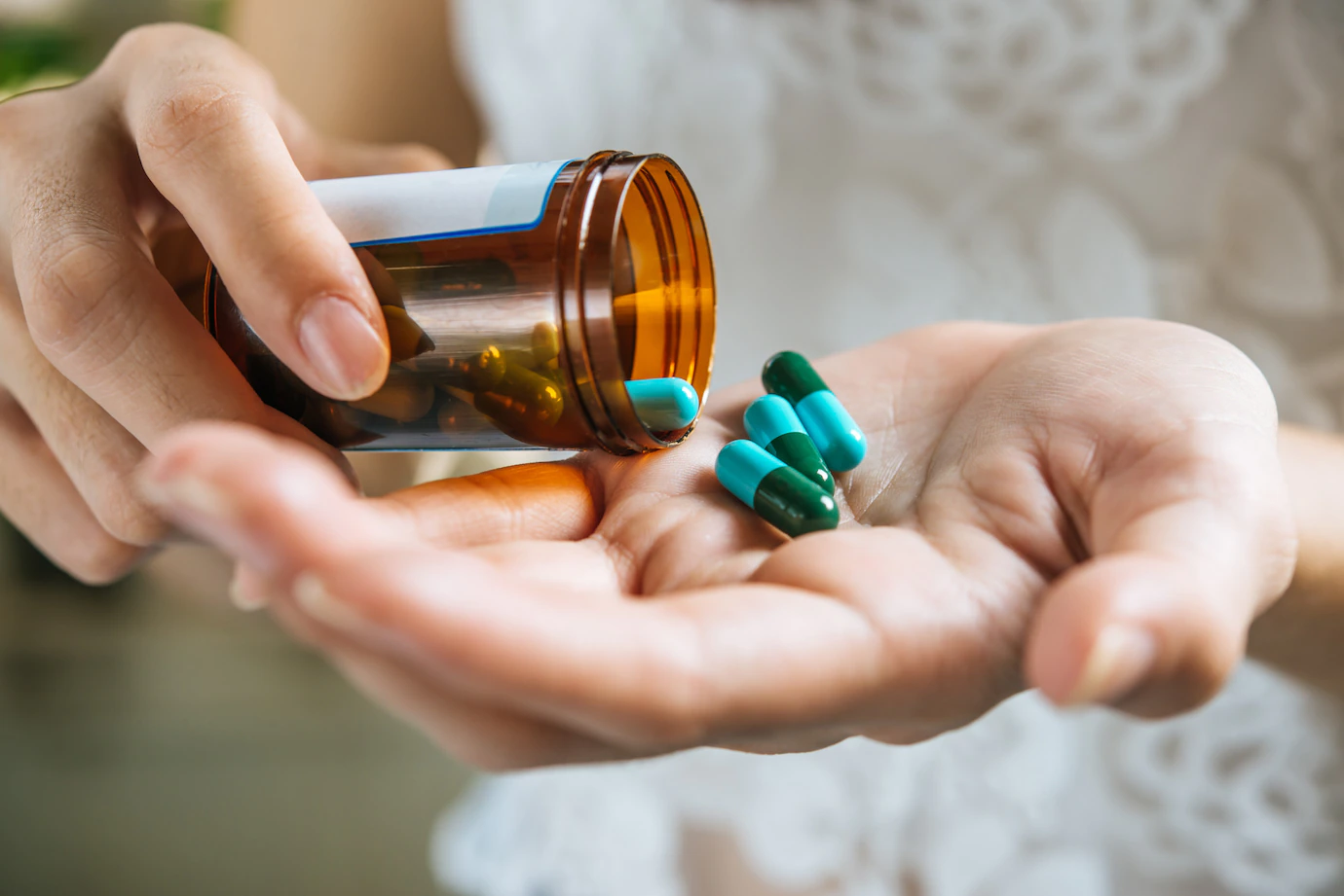 Woman S Hand Pours Medicine Pills Out Bottle 1150 14190