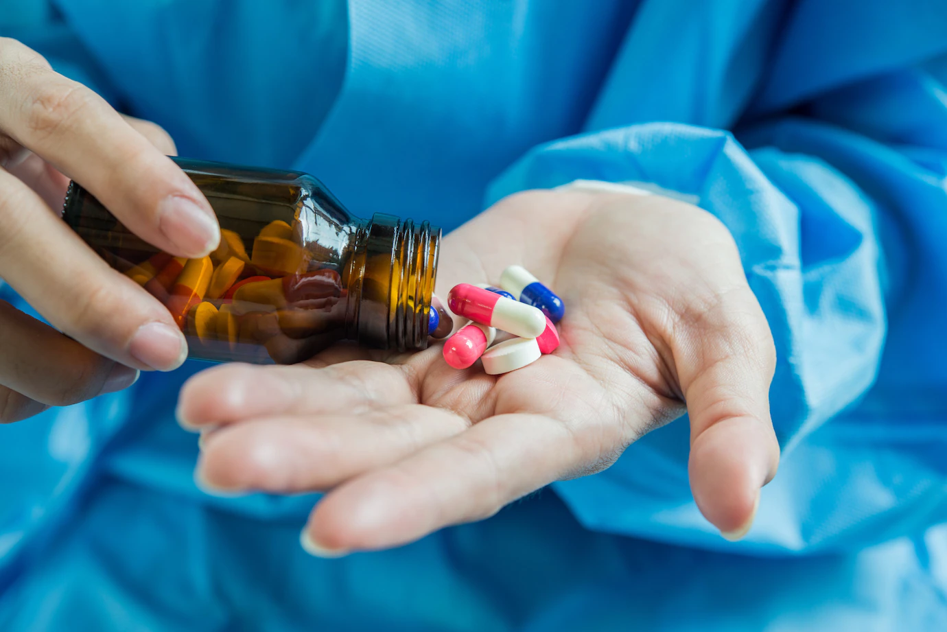 Woman S Hand Pours Medicine Pills Out Bottle 1150 14201