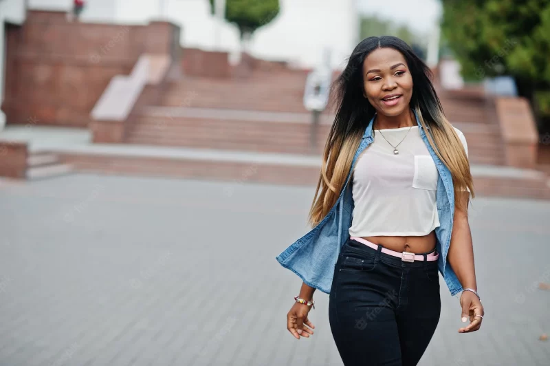 Young black female posed in the city African women single portrait Free Photo