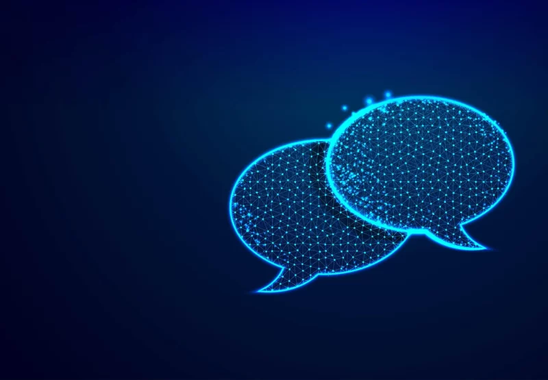 Dialogue chat clouds speech bubble icon from lines triangles and particle style design low poly technology devices people communication concept on blue background Free Vector