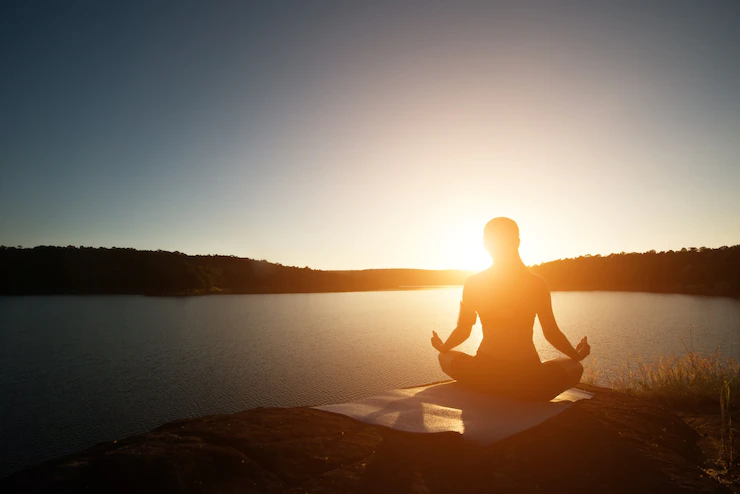 Sun setting while doing yoga Free image download